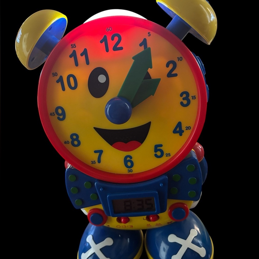 Learning Center interactive toy clock. In good working order. Light on top.